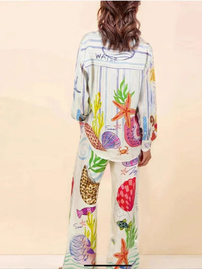 بذلة أنيقة بطبعة مستوحاة من عالم البحار لأجواء الصيف